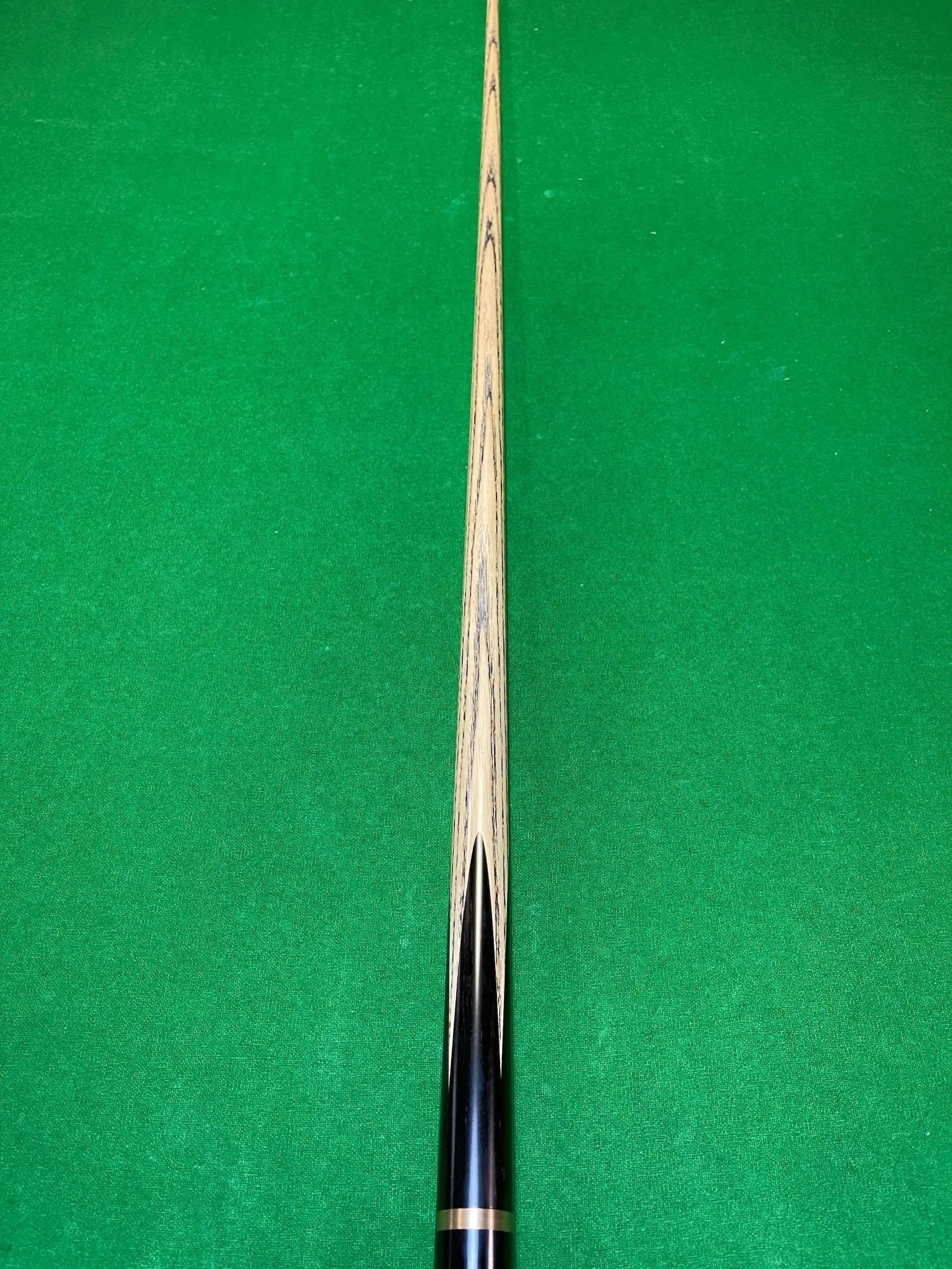 What are snooker cues made of?